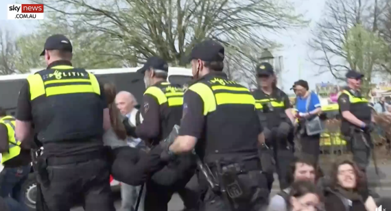 Gretha Thunberg is carried away by Dutch police from a sit-in earlier in April.